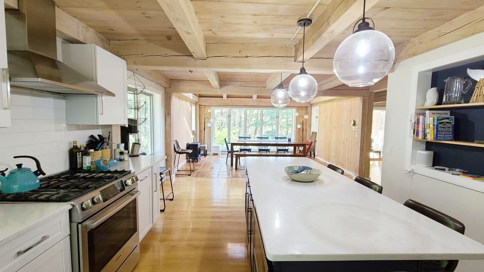 Kitchen opens to dining area