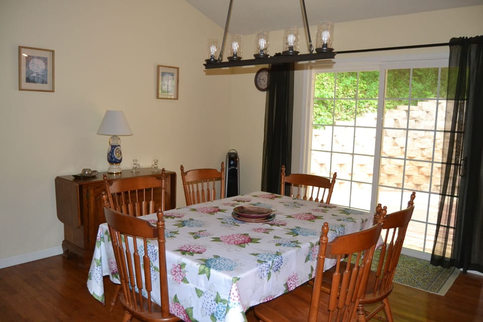 Dining toward back deck space, bar-b-que patio.