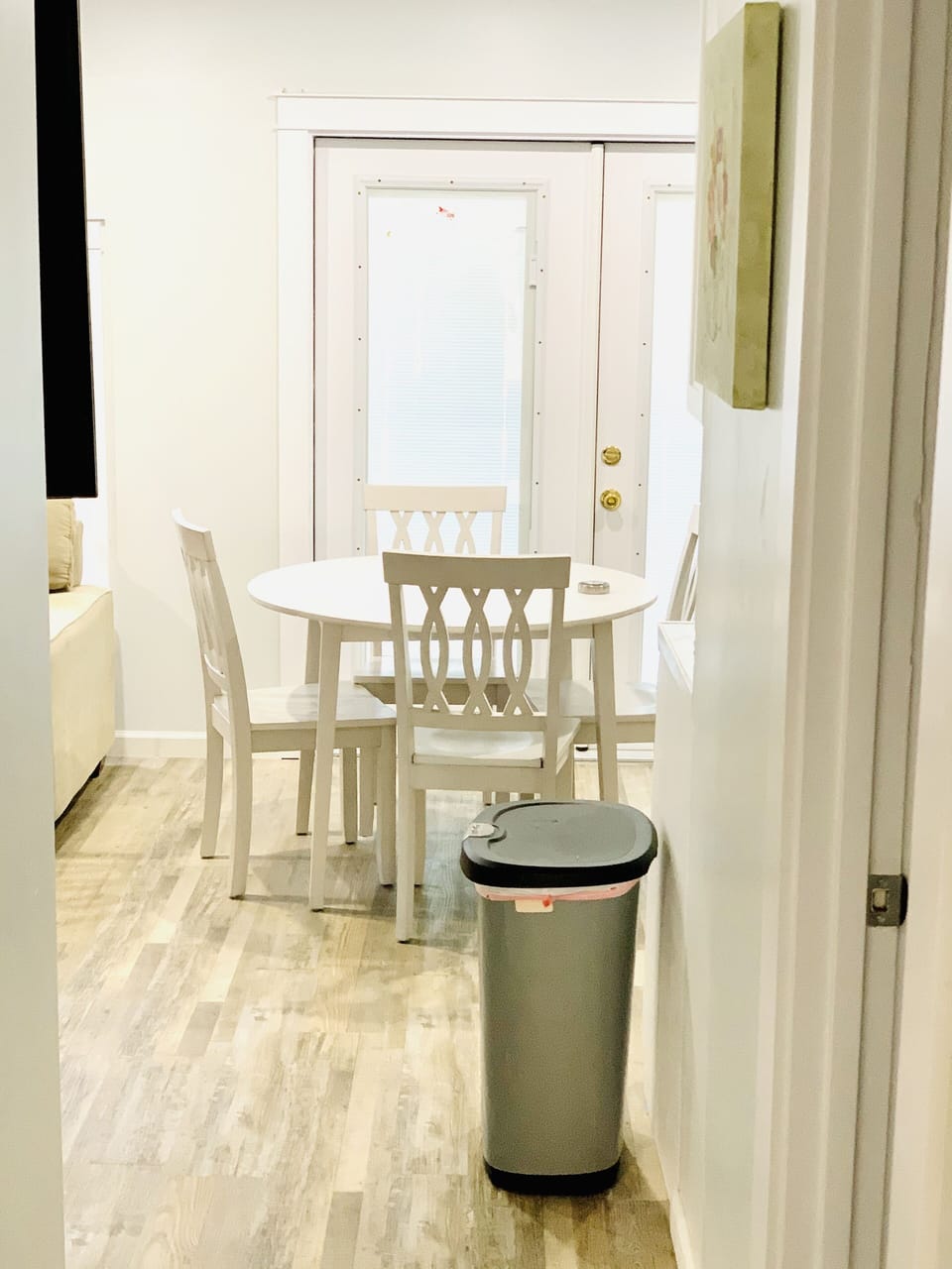 Hallway view to double doors to outdoor  seating 