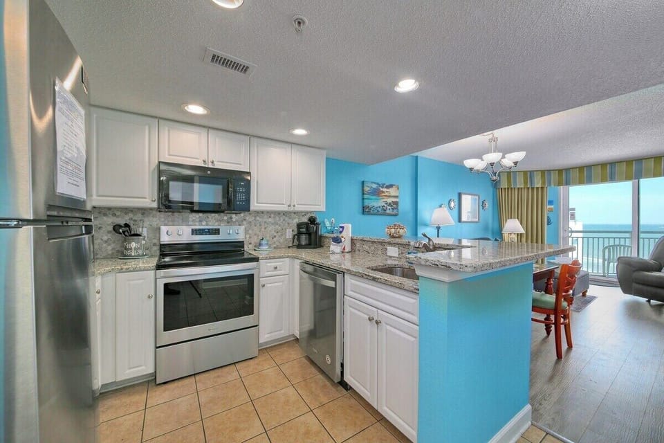 Kitchen with Stainless Stainless Steel Full Size Appliances