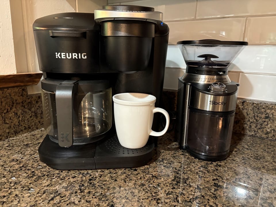 Wake up to fresh, easy coffee with a Keurig, full-pot brewer, and burr grinder all ready on the counter for the perfect morning brew.
