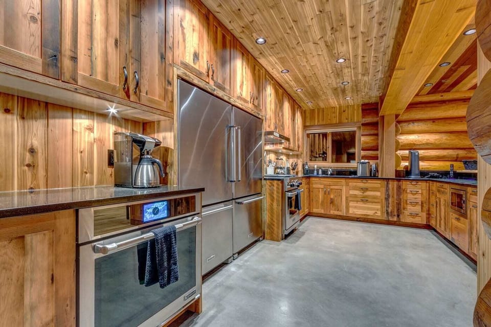 Updated kitchen with 2 fridges, 2 ovens, gas range and all the other necessities