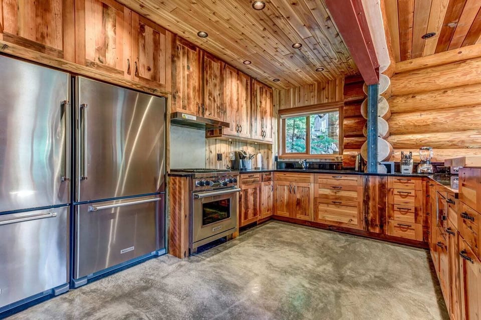 Updated kitchen with 2 fridges, 2 ovens, gas range and all the other necessities