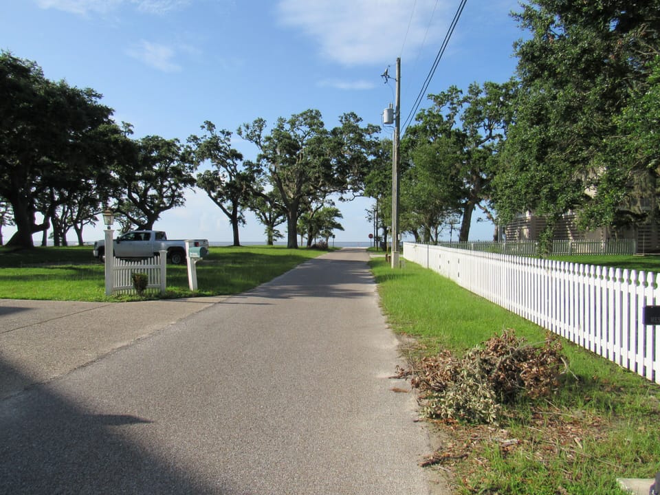 The beautiful white sand beach is only step away from the Penthouse.