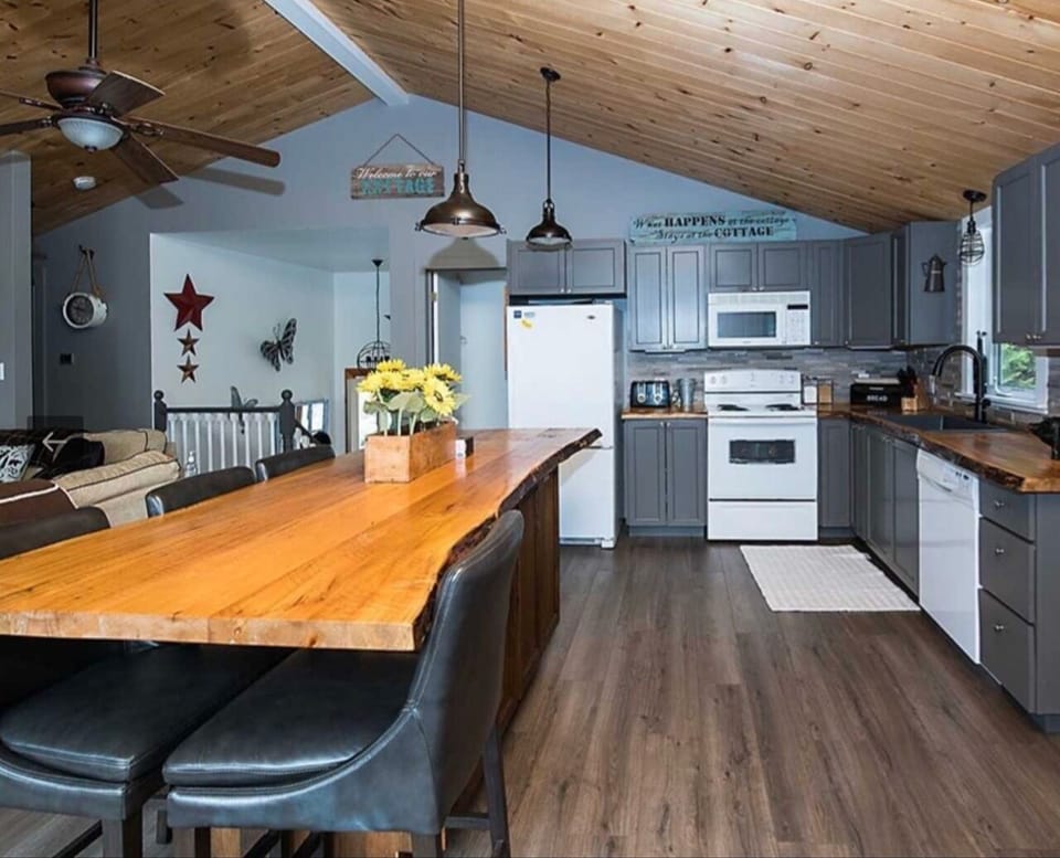 Fully stocked kitchen with beautiful live-edge counters.  Plenty of seating!