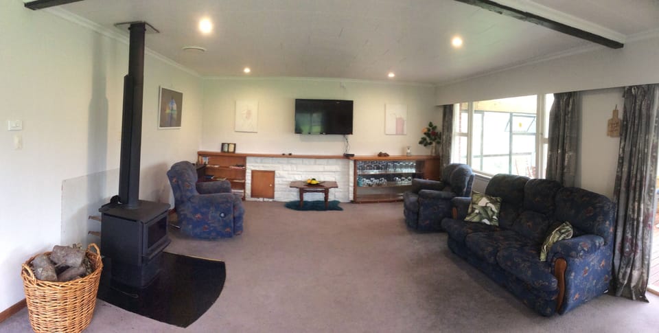 Comfy recliner chairs and cozy wood burner