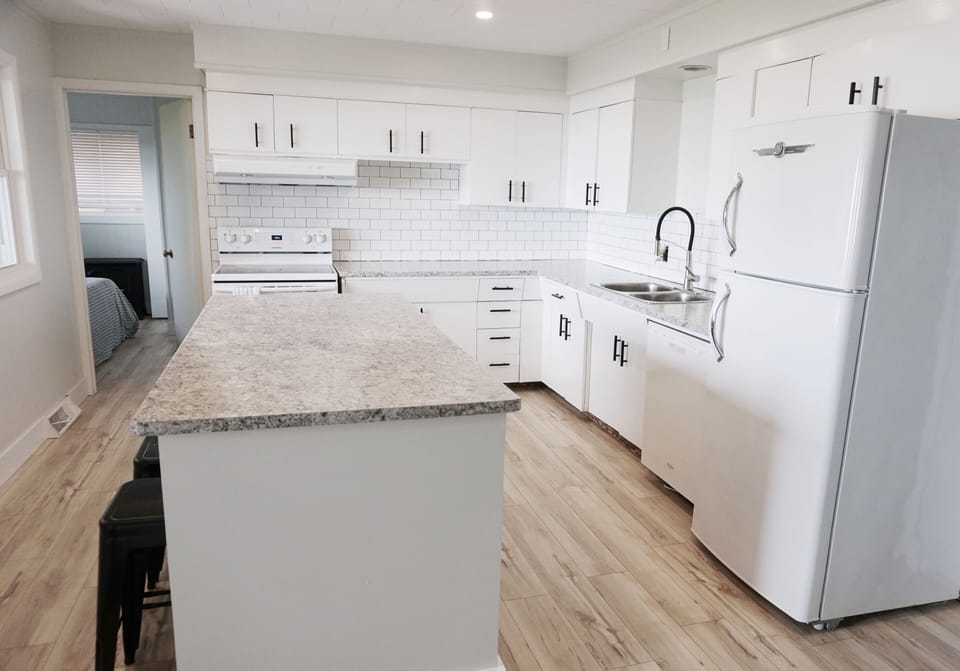 Refreshed and Bright Kitchen with Island for Seating