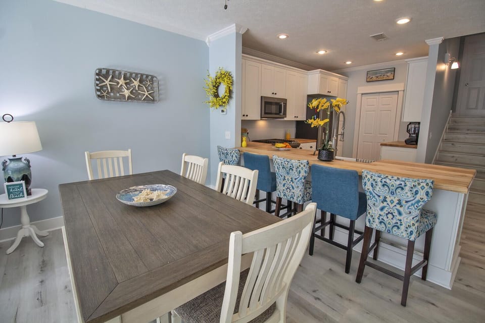 The open concept living, dining and kitchen