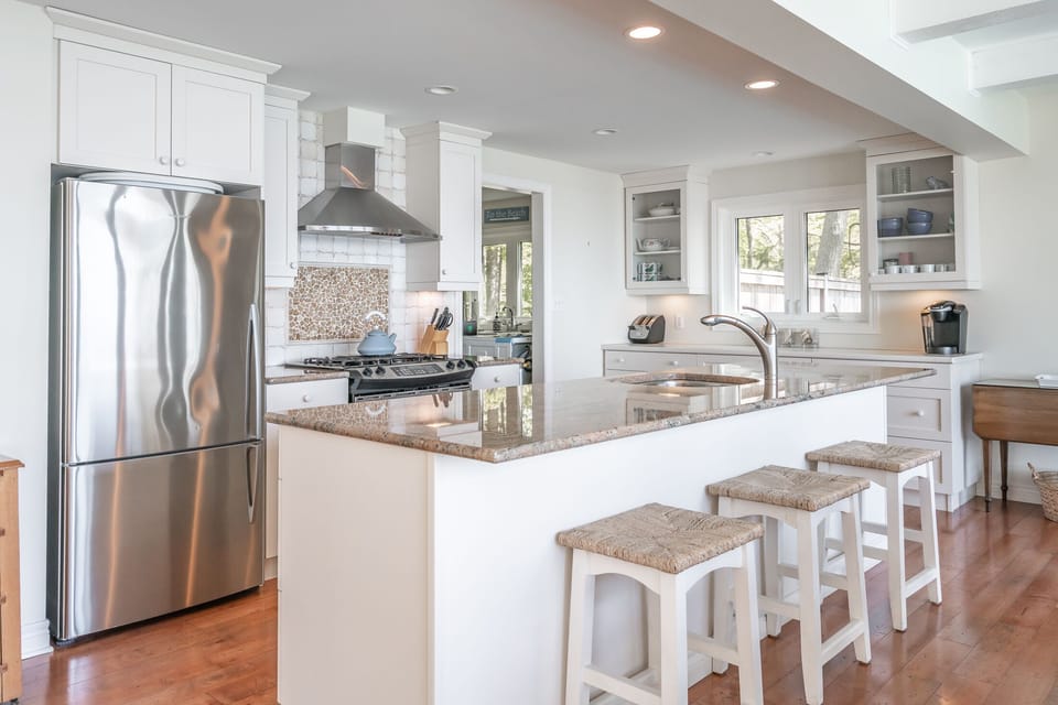 Updated kitchen with stainless appliances and gas stove