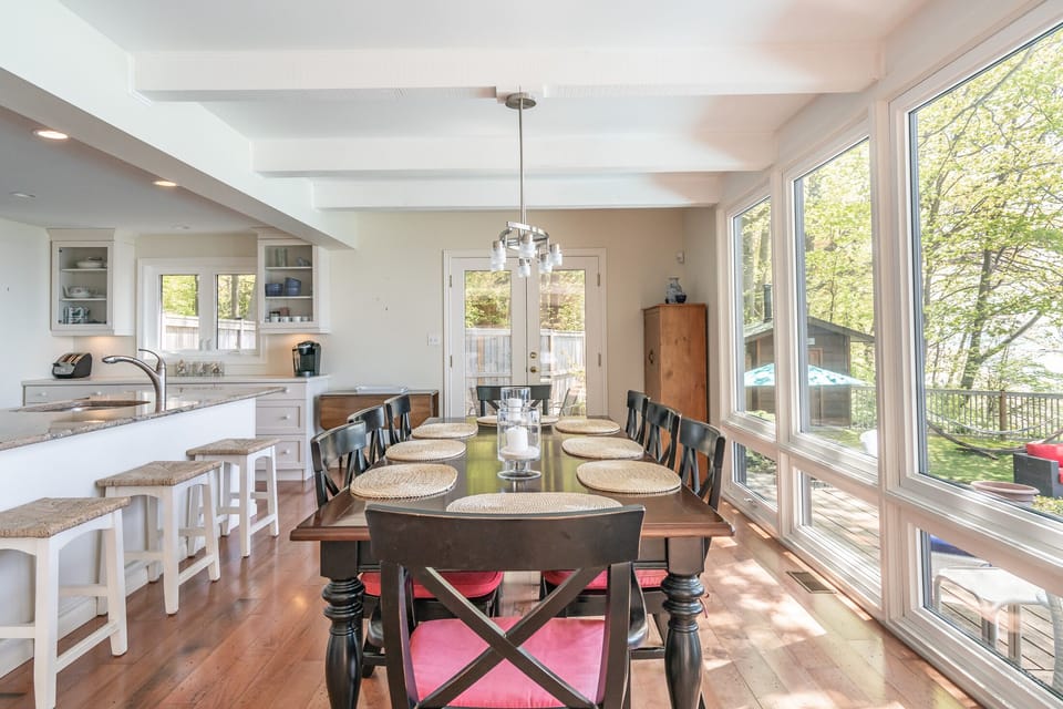 Dining open to the kitchen.  Table seats 8