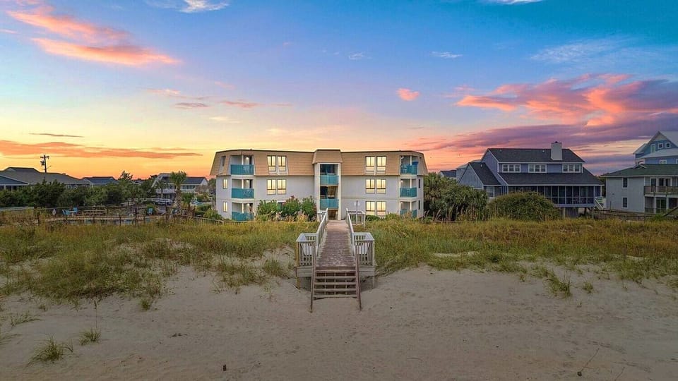 Rear of SouthPoint Villas from the beach, showing the boardwalk over the dunes