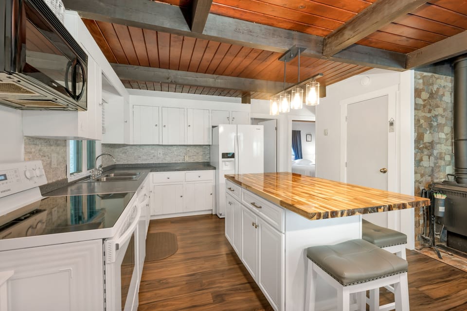 Clean kitchen equipped with most amenities you may need