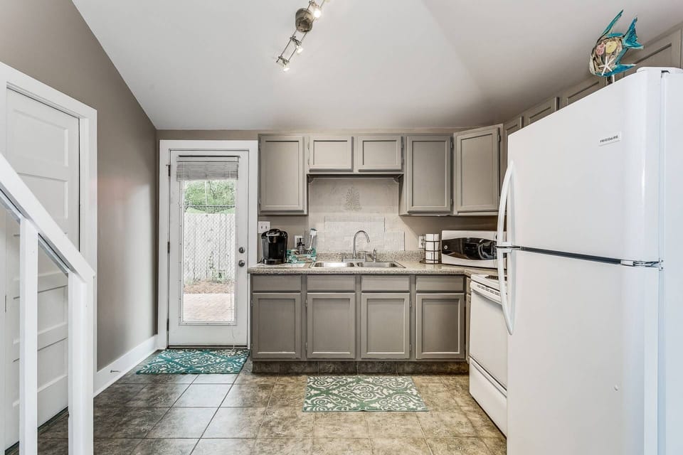 Full kitchen and access to the back patio