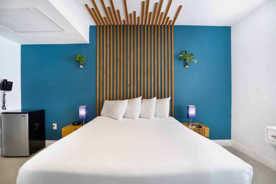 Drift off peacefully with soft lighting and serene modern style.