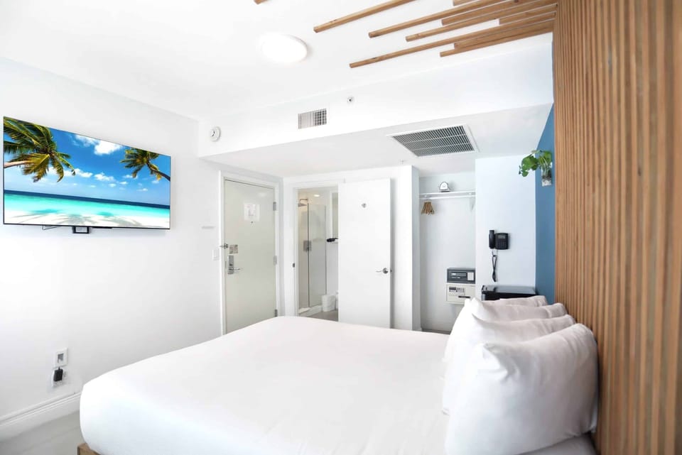 Relax into plush pillows in a calm, minimalist retreat.