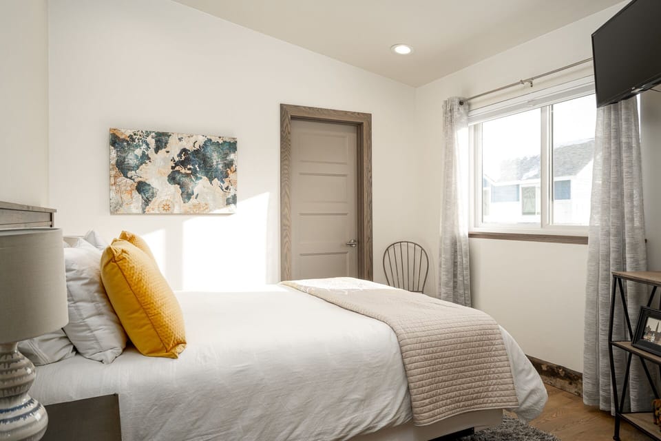 Small flat screen TV in the bedroom.