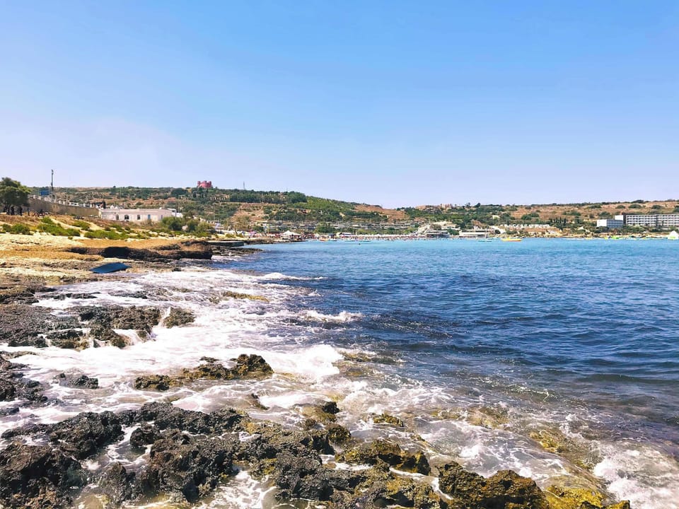 Mellieha's rocky beach right before the sandy stretch starts