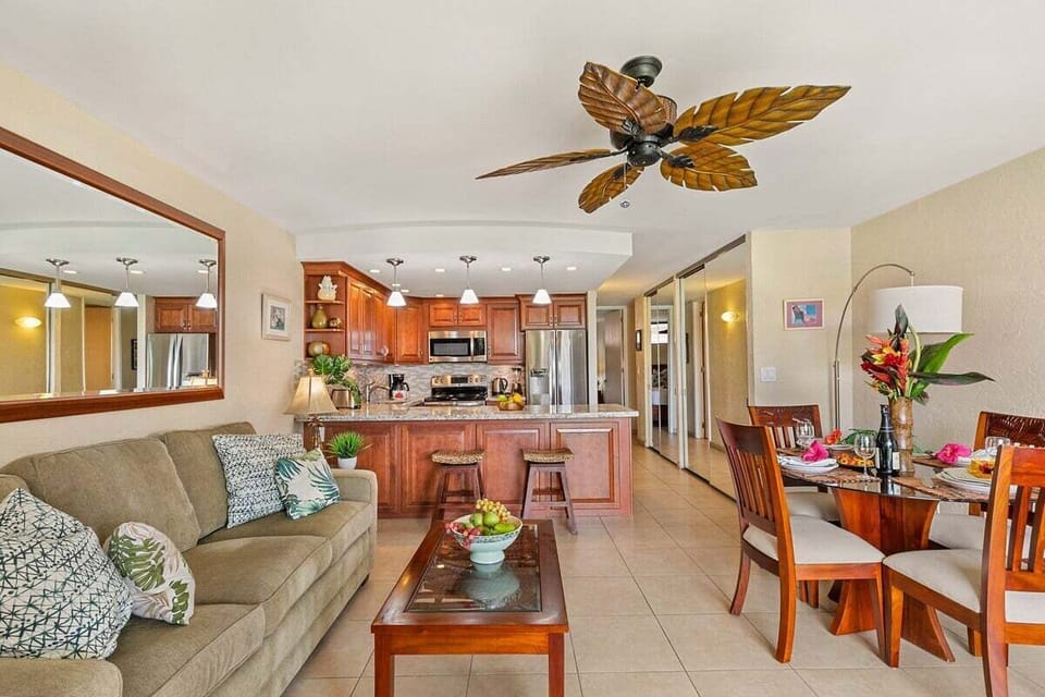 Relax in a bright living space with island style.