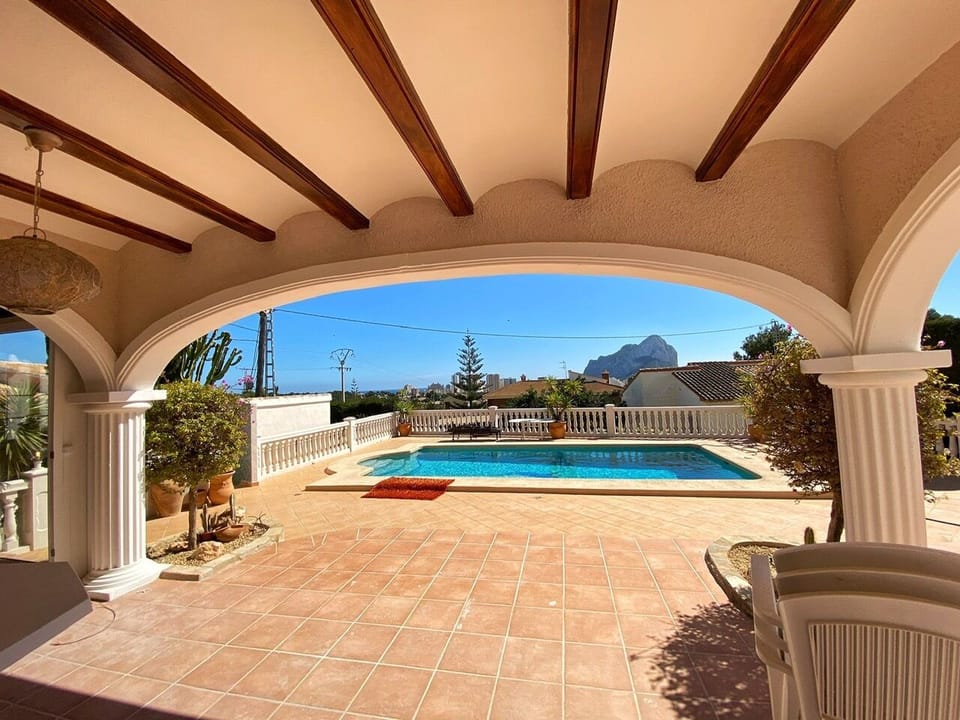 Open terrace with a pool view