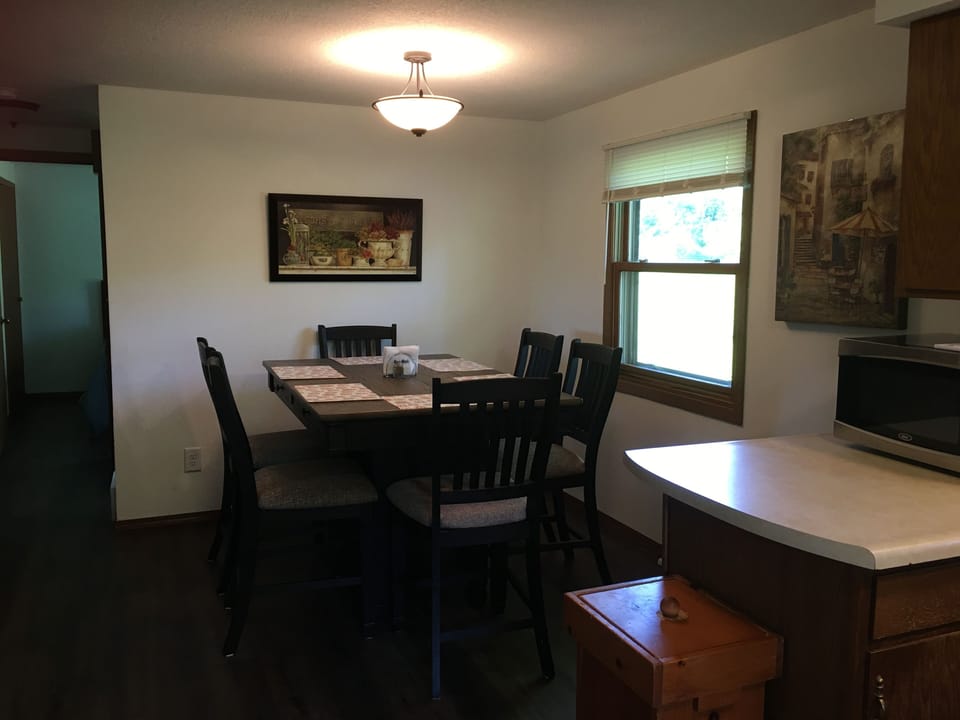 High top kitchen table seats 6 comfortably.