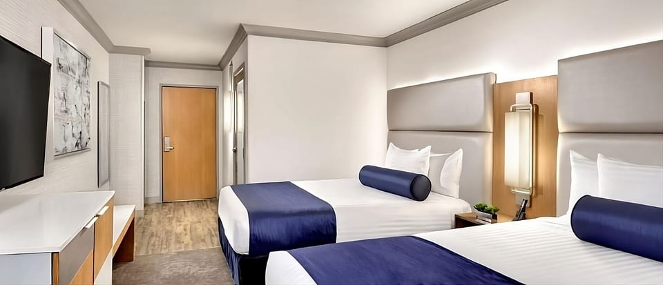 Comfy 2 Double size beds; perfect for your vacation! Exact unit will be assigned upon arrival. Views, colors and decor may vary.