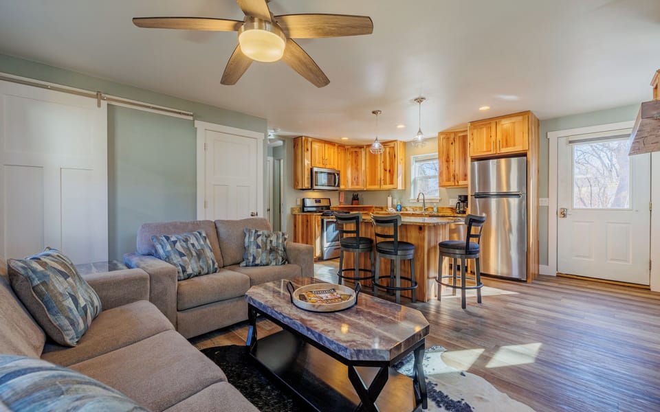 Plush seating in the living room with a sleeper sofa for additional guests