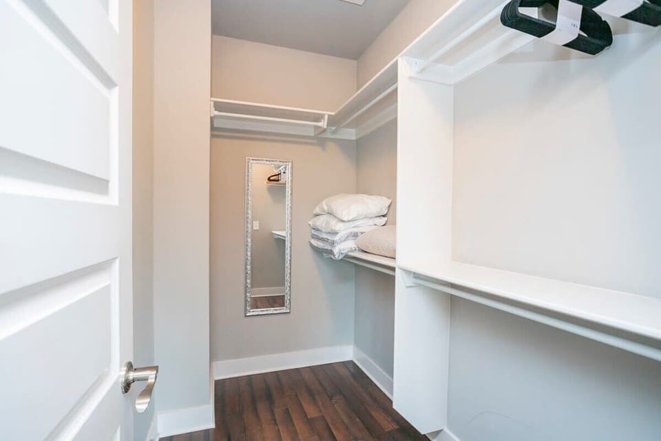 Master Bedroom Closet - 2 Twin Rollaway Beds Stored Here