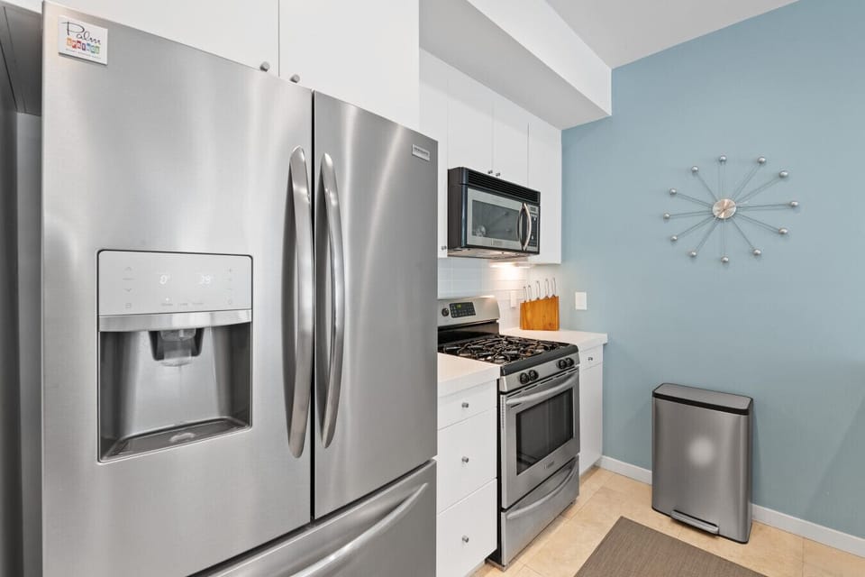 Fully Stocked Kitchen with Modern Appliances and Ample Storage