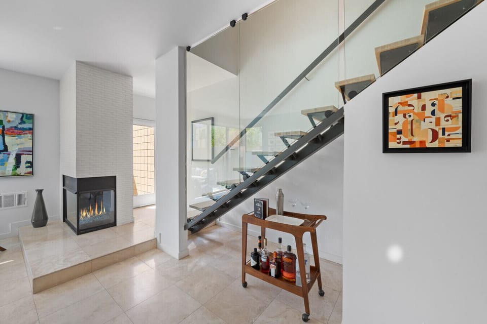 Light filled living and dining area with contemporary architectural details.