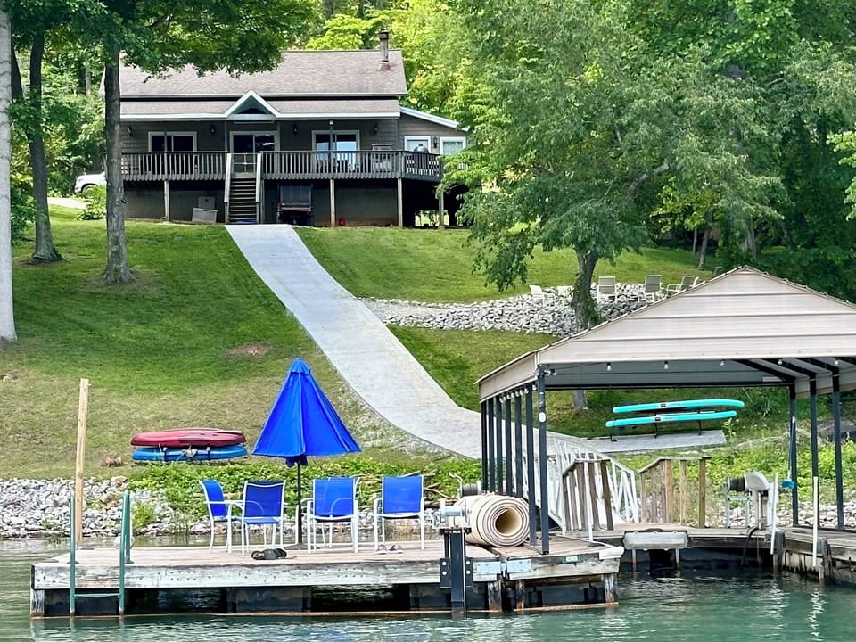 View of the rear of the house from the lake - hill is steeper than it appears