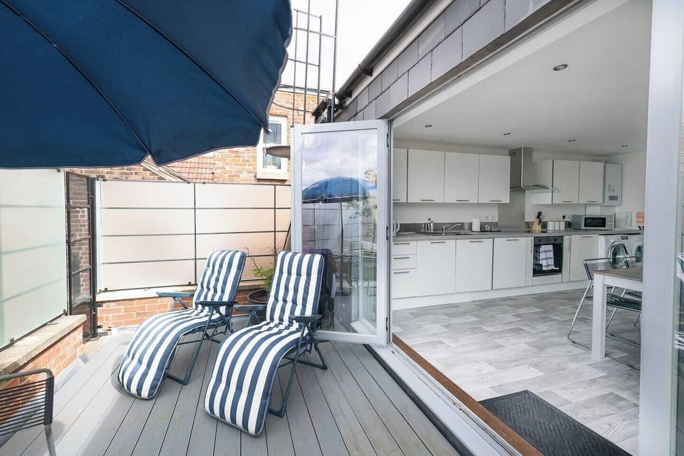 Outdoor Lounge: Relax in stylish deck chairs, sip coffee under the sun, and enjoy vibrant views!