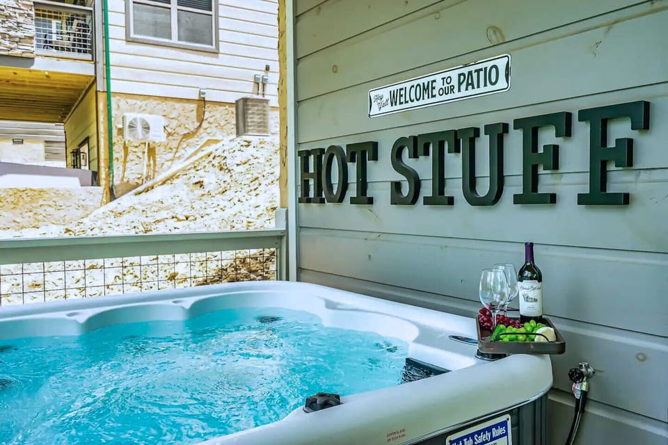 Unwind in the 5-seat hot tub on the lower balcony, conveniently located just outside the pool room.