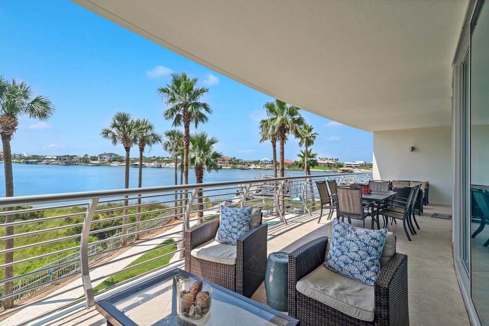 This architectural design seamlessly integrates indoor and outdoor living with a spacious balcony offering expansive water views. The perfect extension of the living space for enjoying the coastal ambiance.