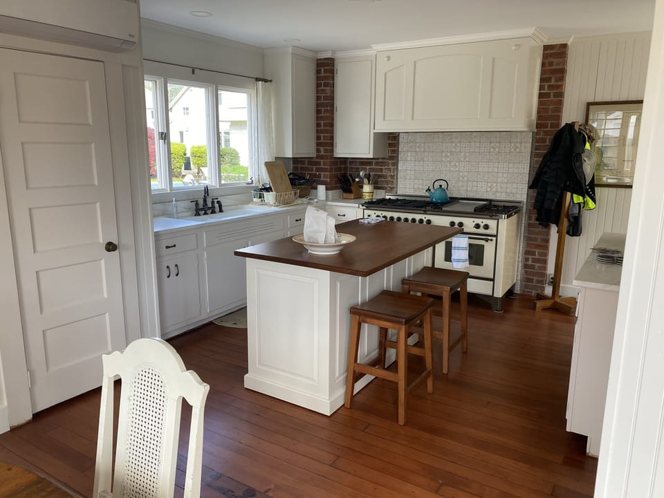 Kitchen with 60” seven burner stove 