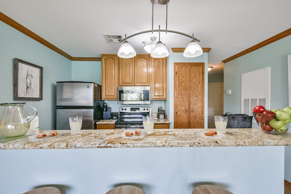 Full size kitchen equipped with all of the tools for a home cook.