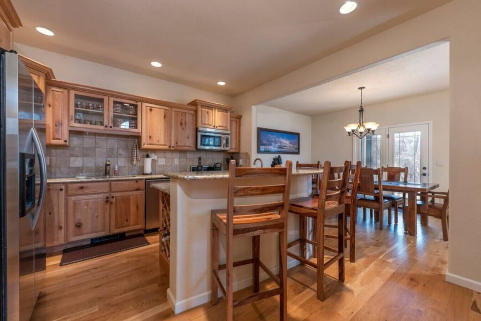 Kitchen with Granite Counters and Bar Seating