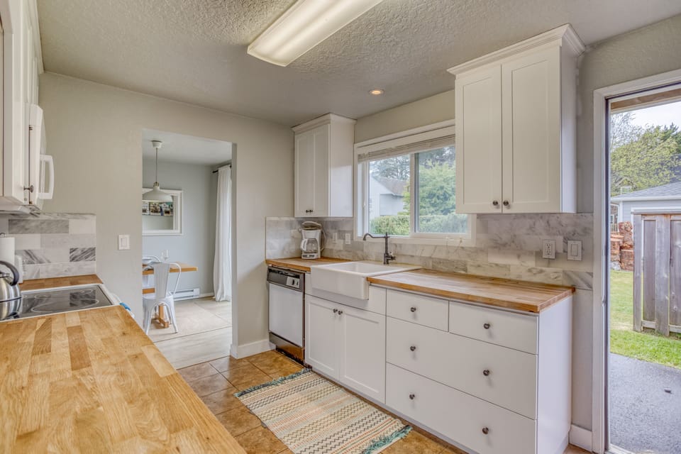 Kitchen with Window view of Back Yard