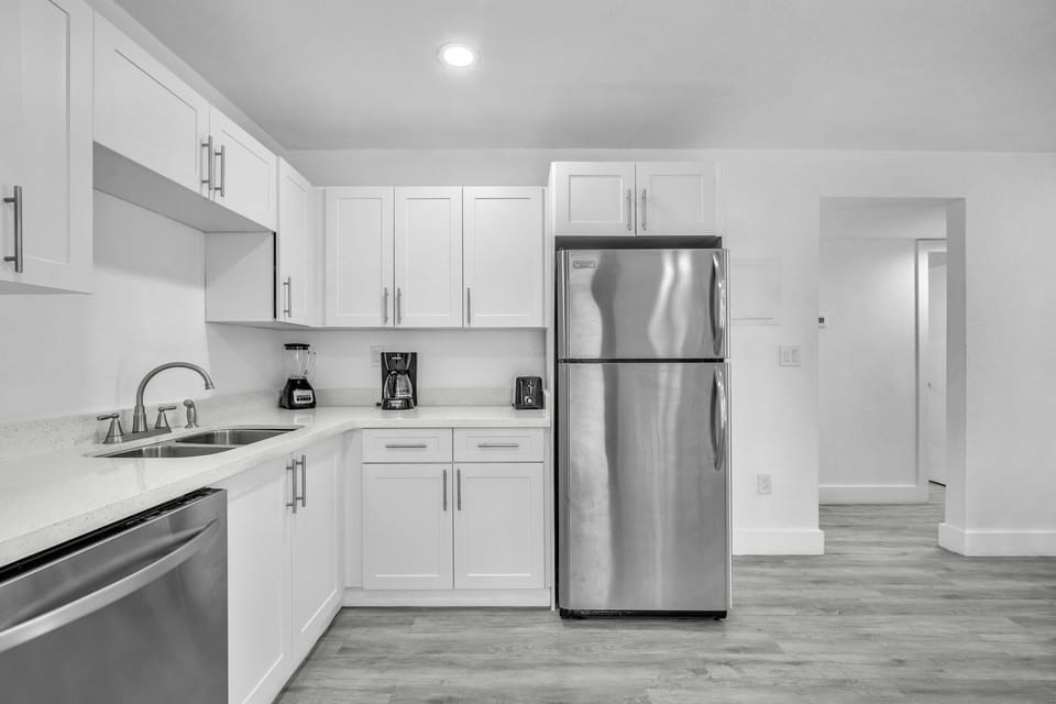 Enter a well-appointed kitchen, fully equipped with all the essentials you require to prepare your favorite meals.