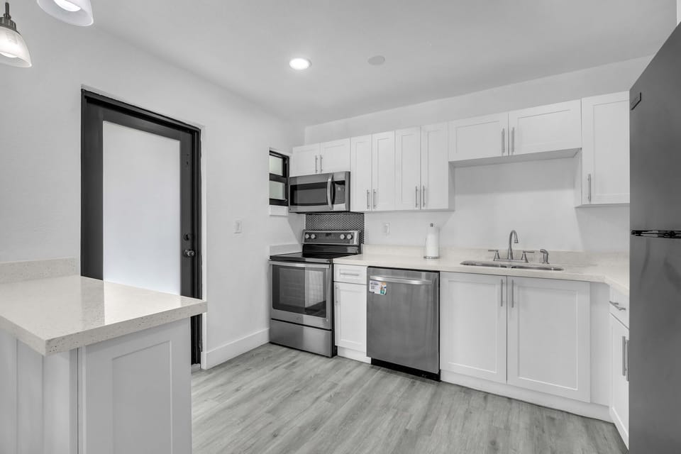 Enter a well-appointed kitchen, fully equipped with all the essentials you require to prepare your favorite meals.