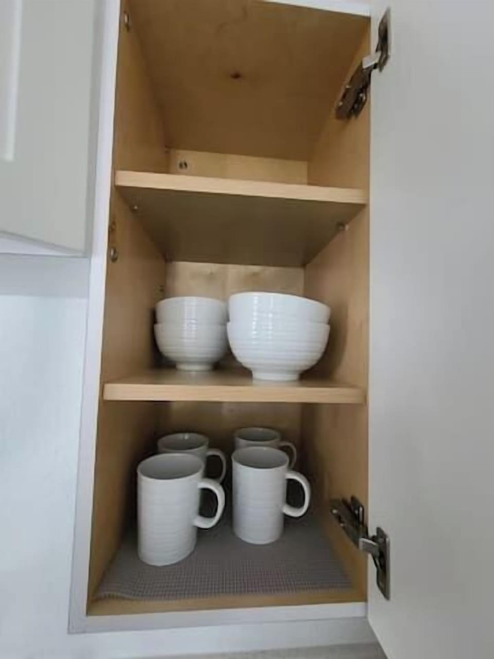 Cups, wine glasses, plates, and other eating and cooking supplies available for your convenience.