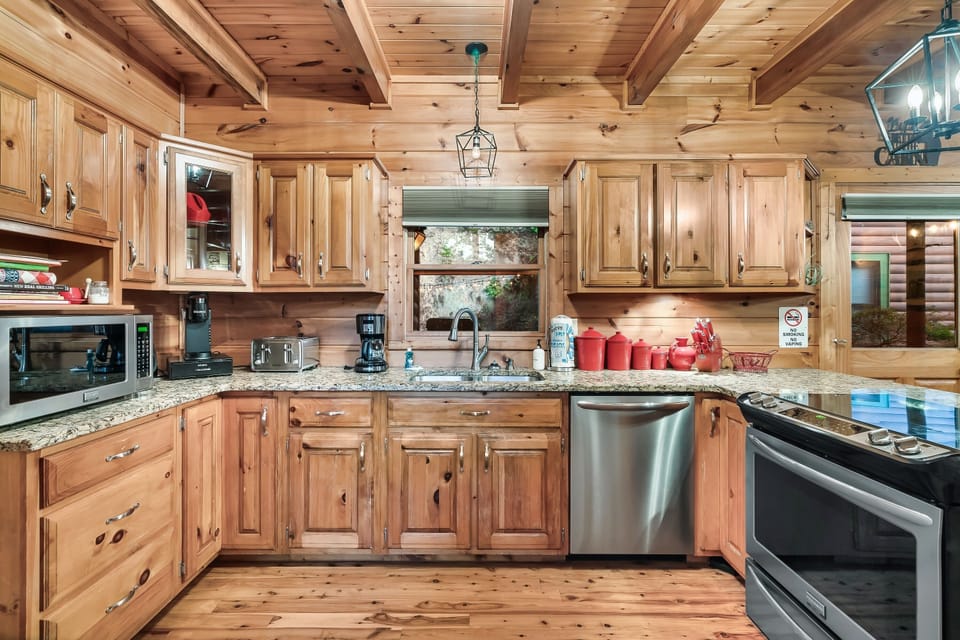 Fully equipped kitchen for meals at the cabin or space to put your takeout leftovers!