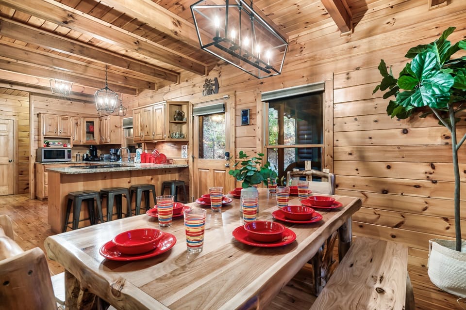 Our dining room features a beautifully crafted, sturdy dining table made by skilled Amish craftsmen. Perfect for enjoying a meal with loved ones or for use as a workspace.