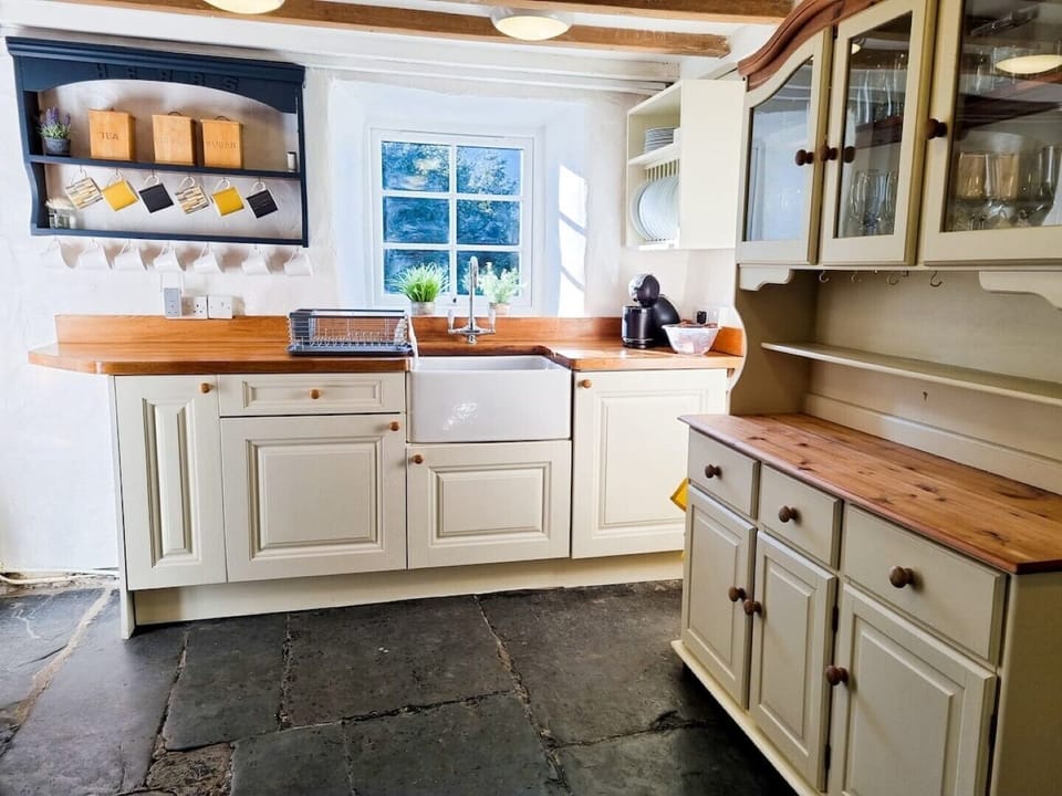 The Kitchen with 2 fridges (freezer in utility room) and dishwasher