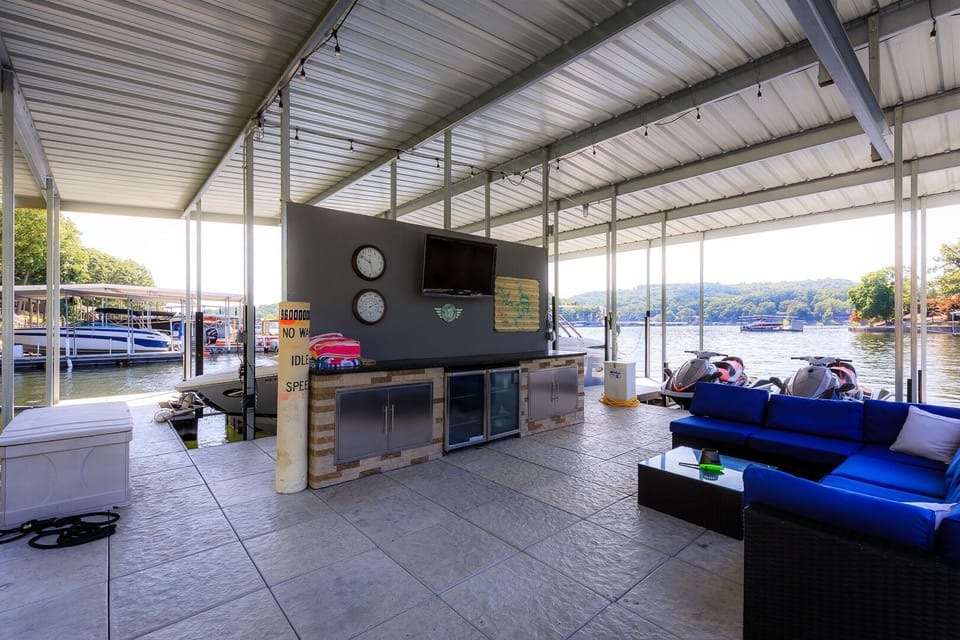 Dock bar with TV, beverage fridges and BT surround sound speaker system