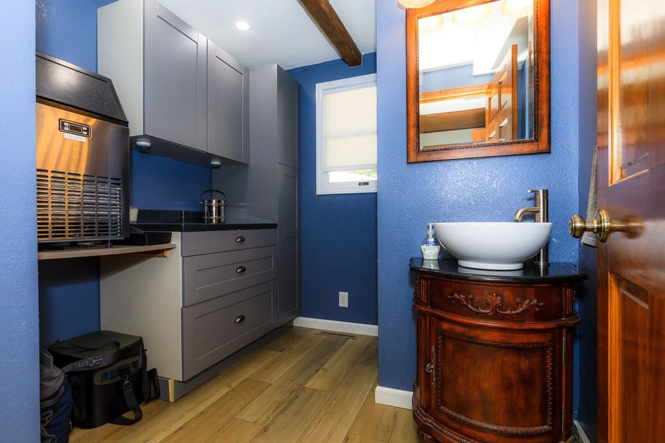 Main floor powder room with ice maker