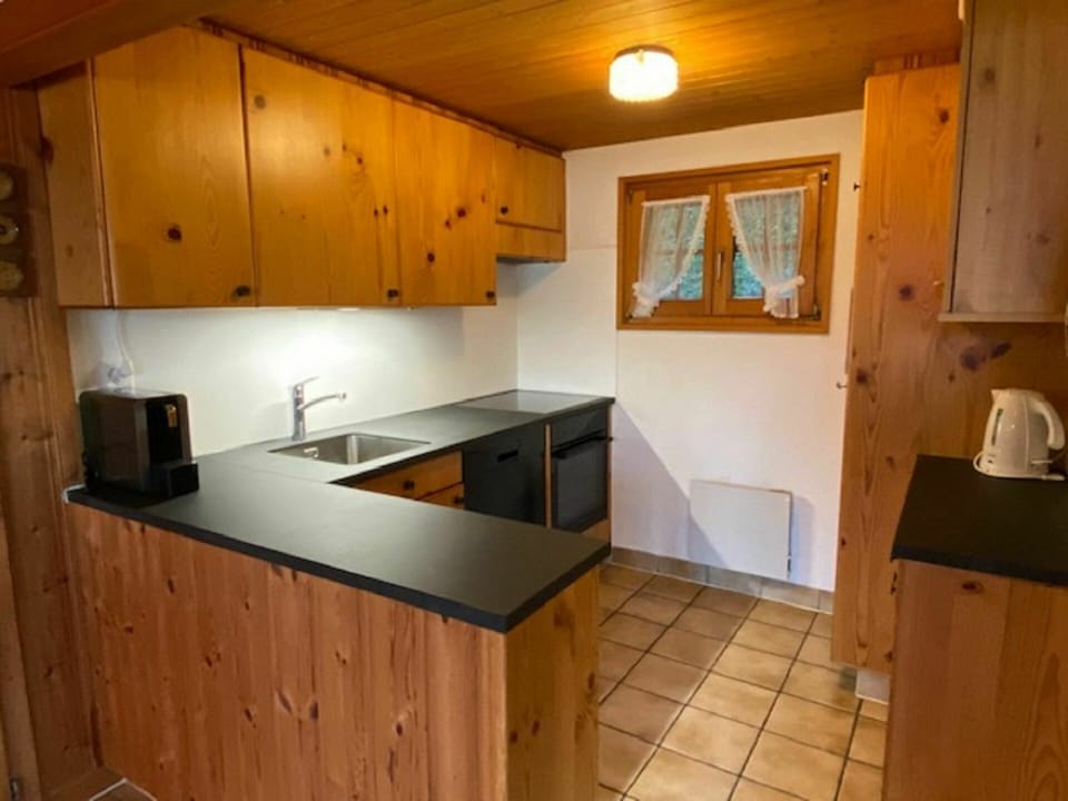 Cabinetry, Countertop, Kitchen Sink, Sink, Kitchen Appliance, Wood, Kitchen, Interior Design, Kitchen Stove, Architecture