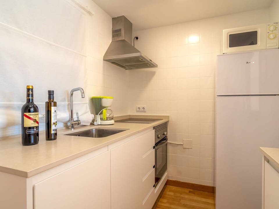 Cabinetry, Building, Property, Furniture, Bottle, Kitchen, Kitchen Appliance, Wood, Interior Design, Kitchen Stove