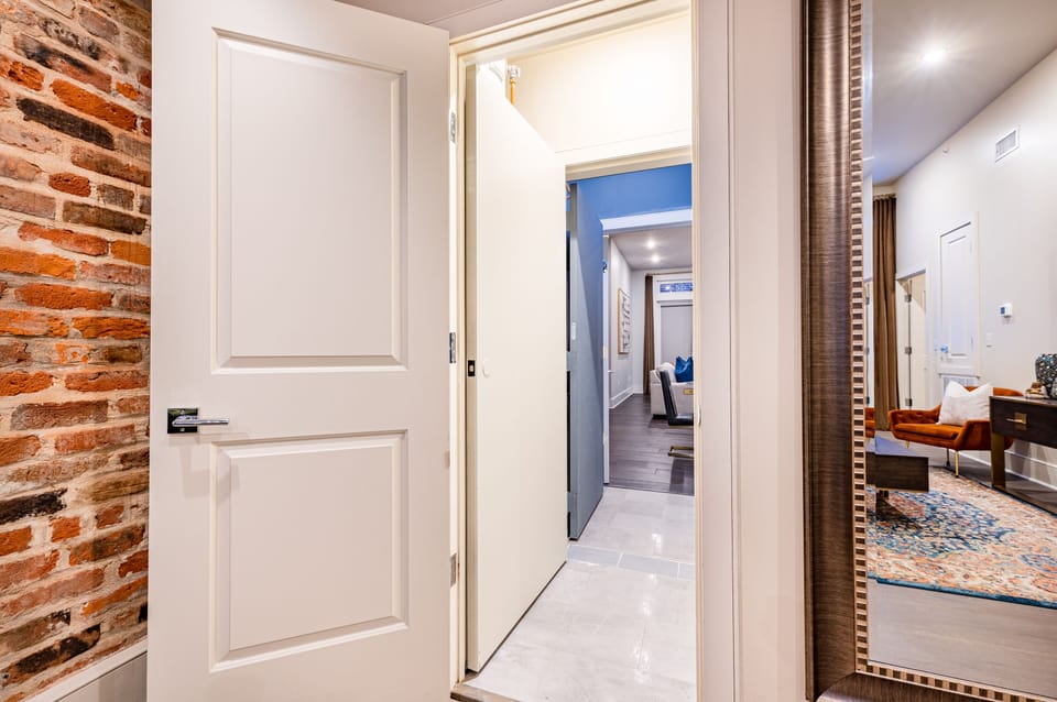 Conjoining door that combines both Side 1 and Side 2, allowing for private access to each side.