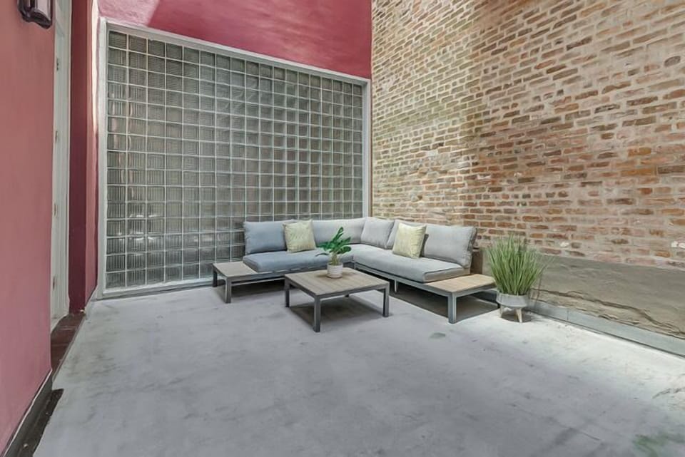 Side 1. Private outdoor terrace with large sectional for outdoor lounging!
