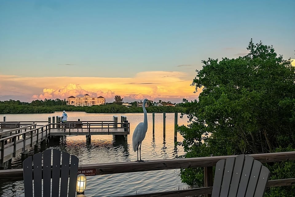 Unwind at sunset beside tranquil waters and coastal breezes